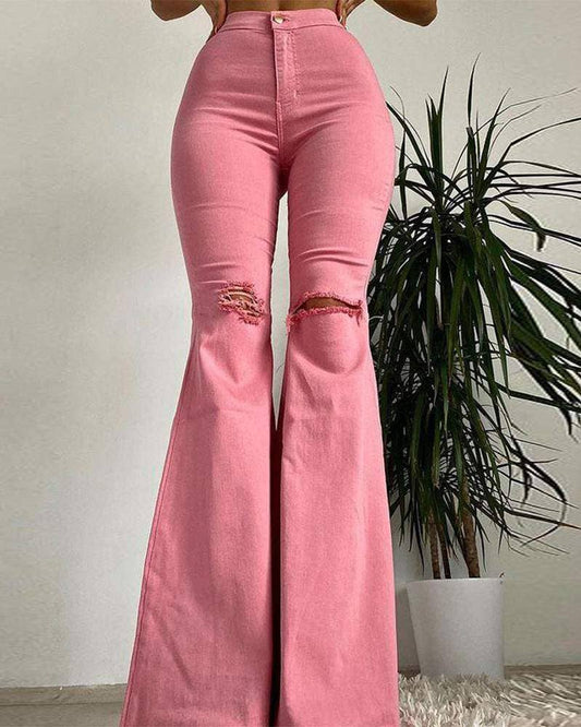 Stretch ripped raw hem flare leg skinny jeans pink