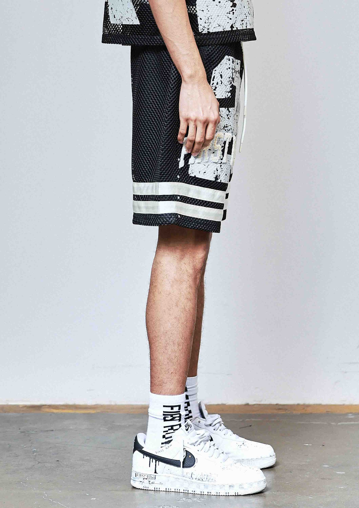 NEVER THE END FOOTBALL SHORTS
